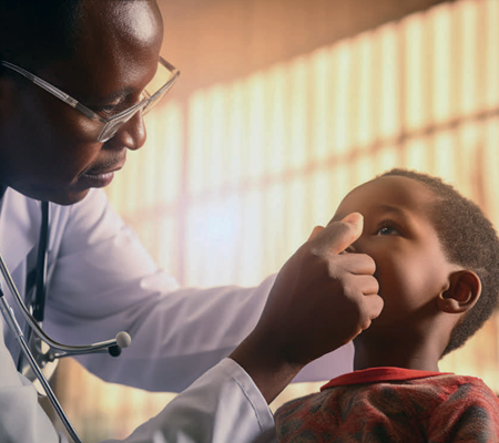 ENT Specialist conducting a patient examination in Harare clinic